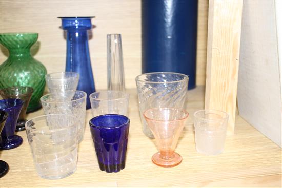 Seven Edwardian coloured glass hyacinth vases, a slender specimen vase and a thirteen other assorted glasses